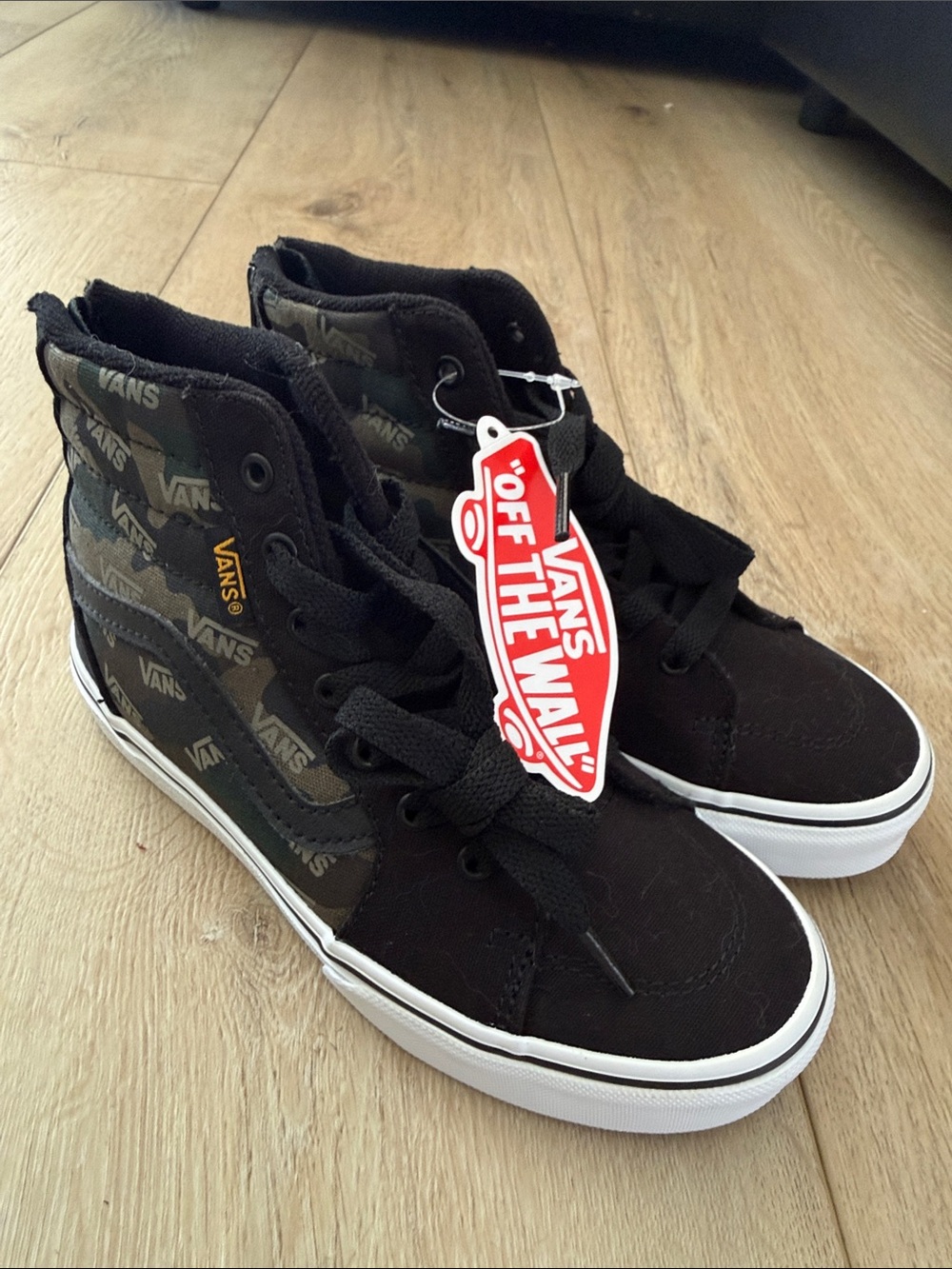 Vans SK8 High Top zip up Sneakers in Black & Olive Camo